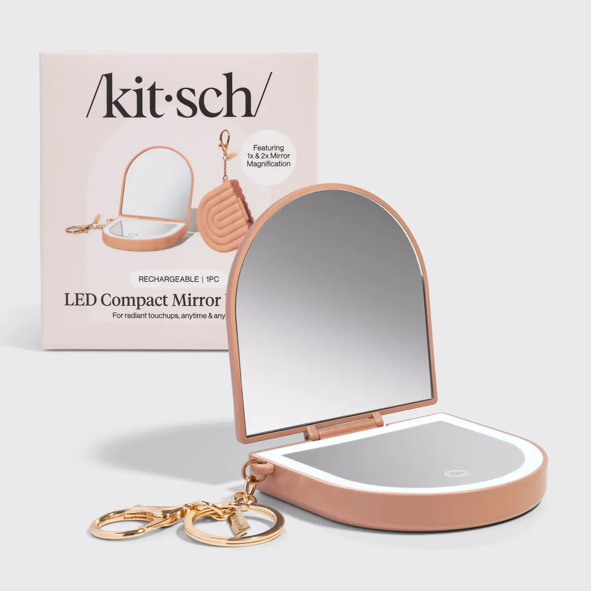 Kitsch LED compact mirror with packaging on a light gray background
