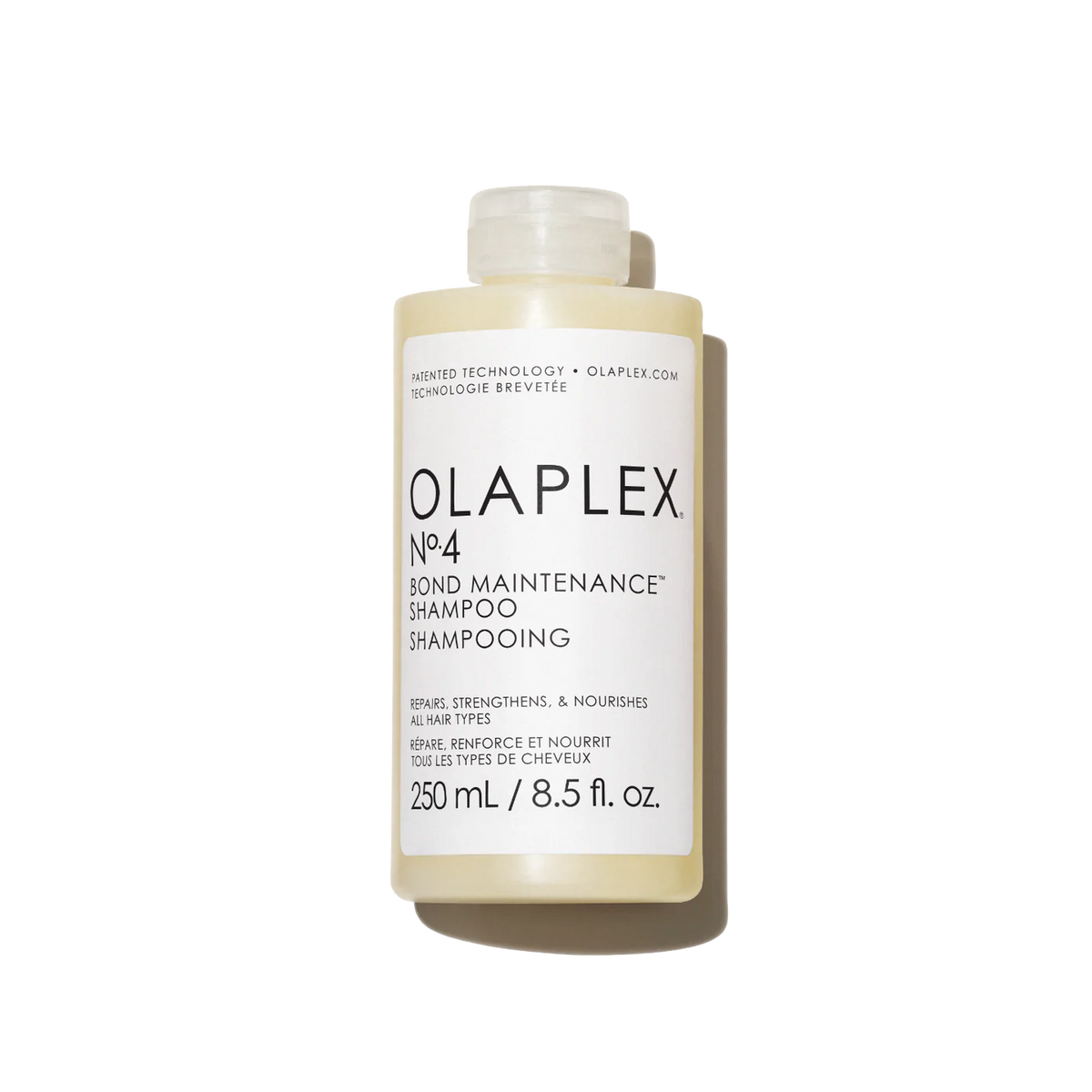 Olaplex No.4 Bond Maintenance Shampoo bottle on a white background
