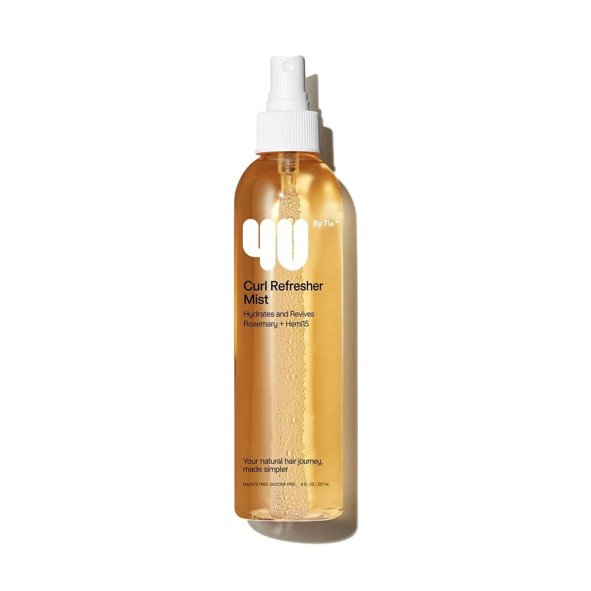 Bottle of Curl Refresher Mist on a white background
