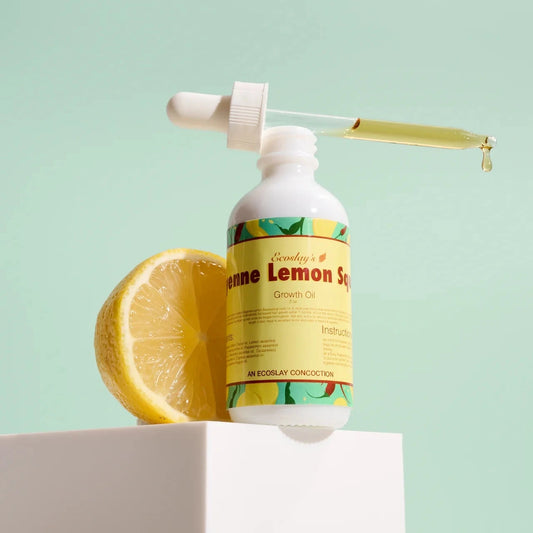 Bottle of lemon-scented product with a lemon slice on a light green background
