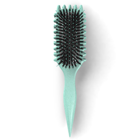 Green hairbrush on a white background