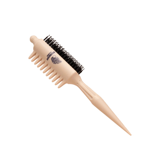 Beige round hairbrush with black bristles on a beige background