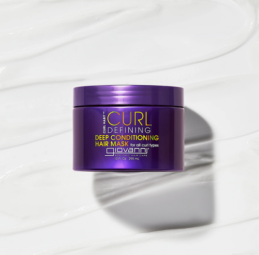 Purple jar of Giovanni Curl Defining Deep Conditioning Hair Mask on a white background