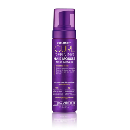 Purple bottle of Curl Habit Curl Defining Hair Mousse on a white background