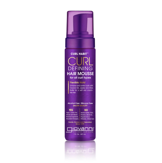 Purple bottle of Curl Habit Curl Defining Hair Mousse on a white background