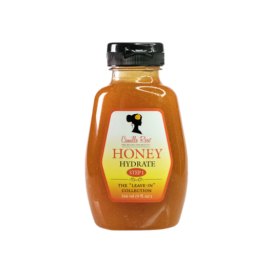 Bottle of honey with a label on a white background