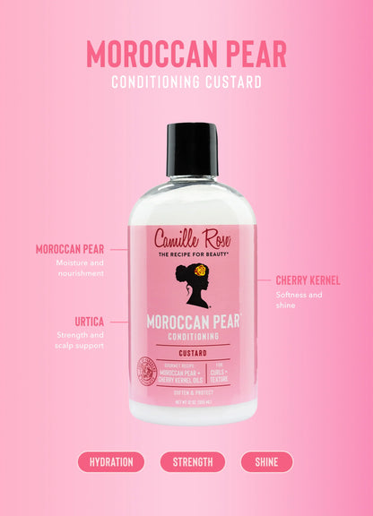 Bottle of Camille Rose Moroccan Pear Conditioning Custard on a pink background