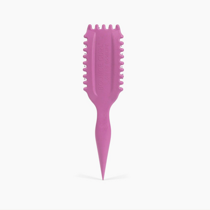 Purple hairbrush on a white background